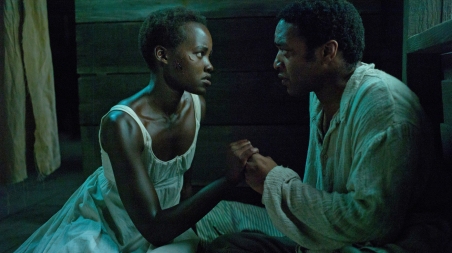 Lupita Nyong'o and Chiwetel Ejiofor play Patsey and Solomon, two slaves on a Louisiana plantation, in 12 Years a Slave.